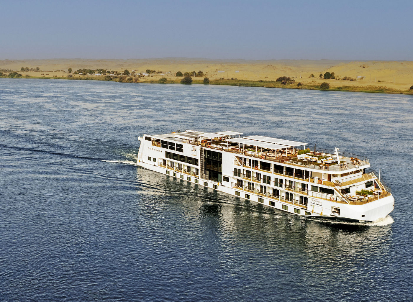 Luxury river cruise ship on calm waters