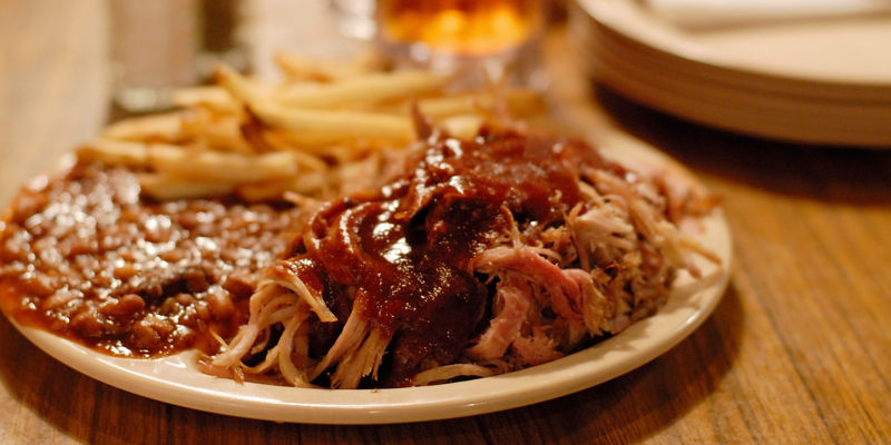 Barbecue plate with pulled pork and fries