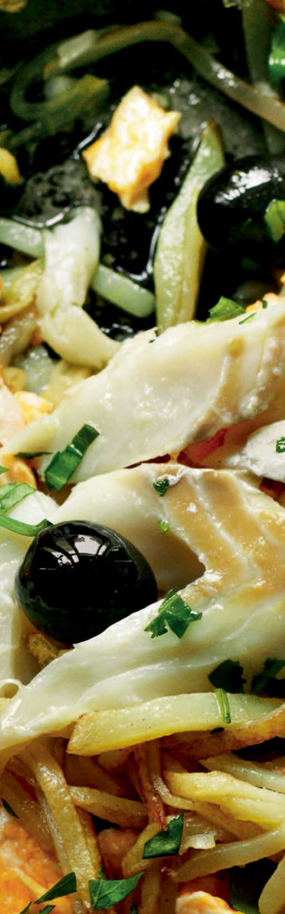 Mediterranean skillet with fish and olives