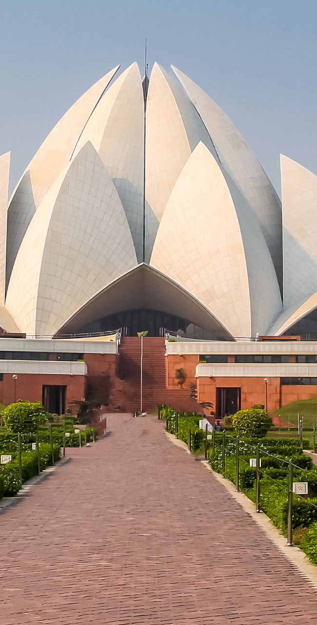 Lotus Temple in lush green surroundings