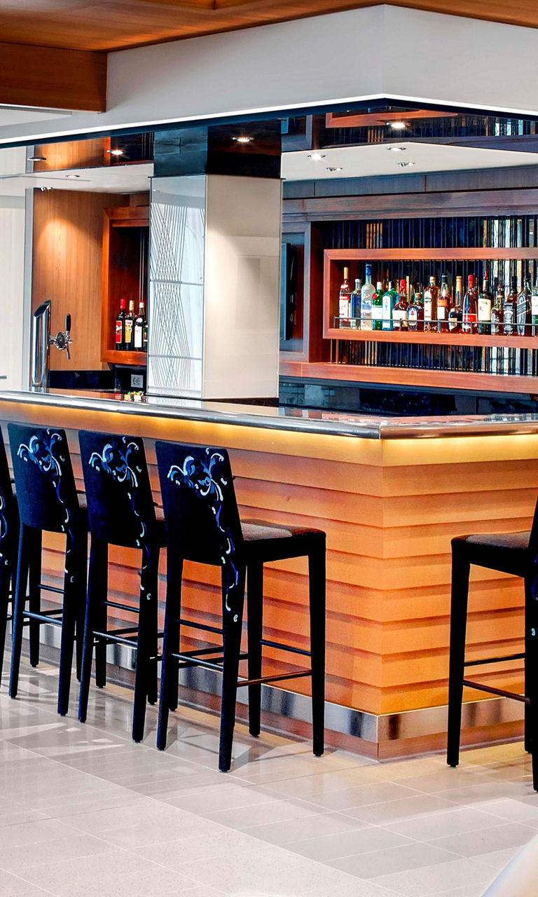 Modern hotel bar with seating area