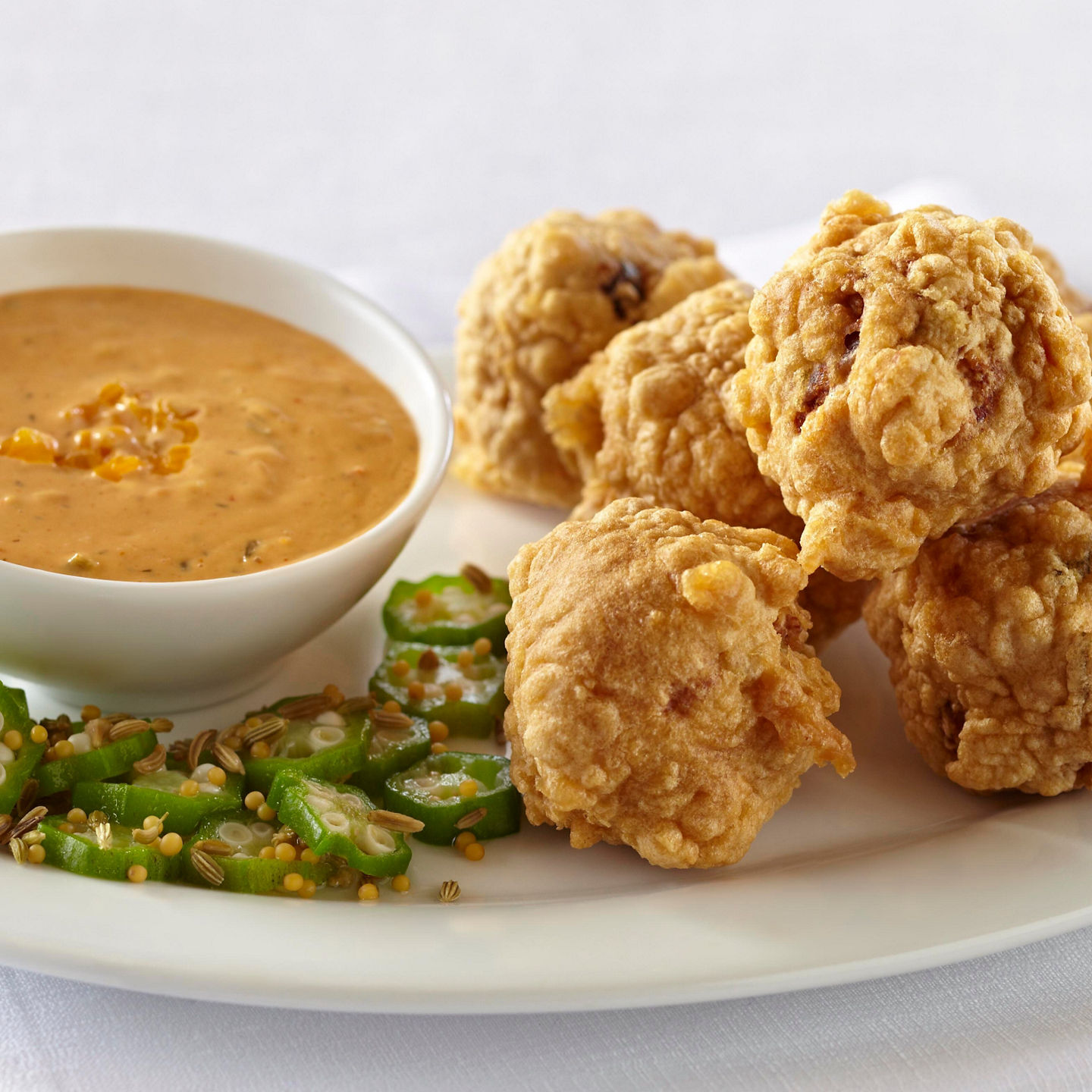 Crispy fritters with dipping sauce