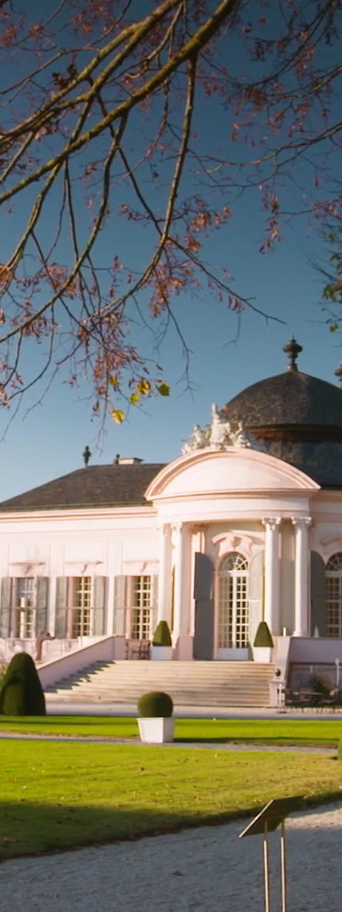 Elegant White Pavilion in Autumn Garden Setting