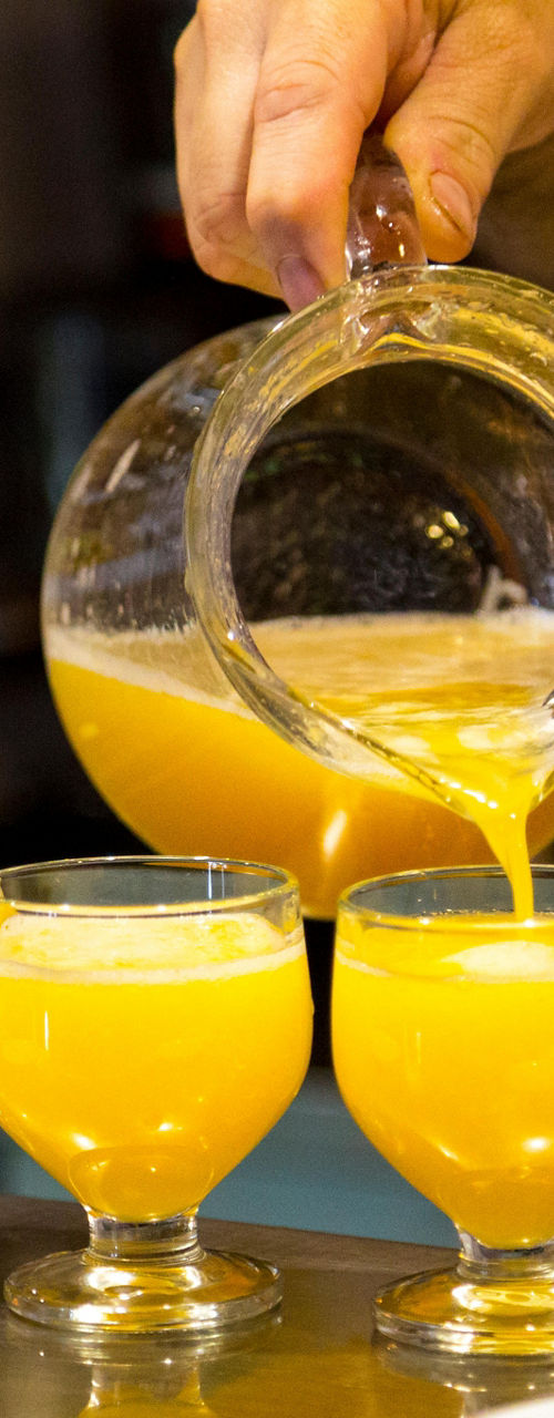 Fresh orange juice served in glass cups