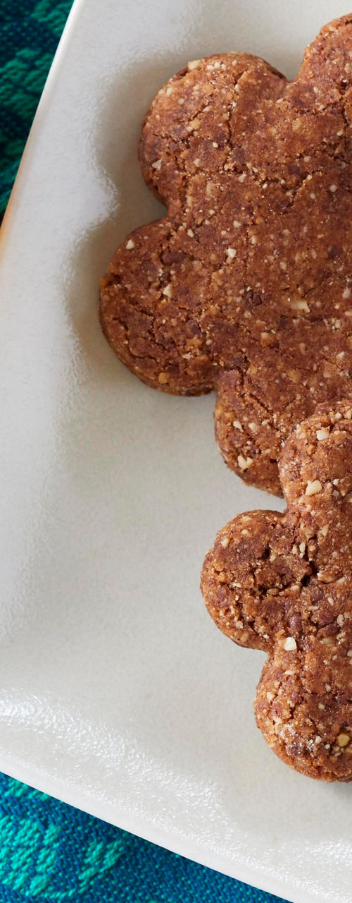 Flower-shaped cookies with coffee cups