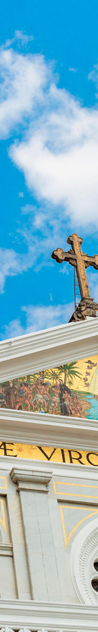Historic church facade with blue sky