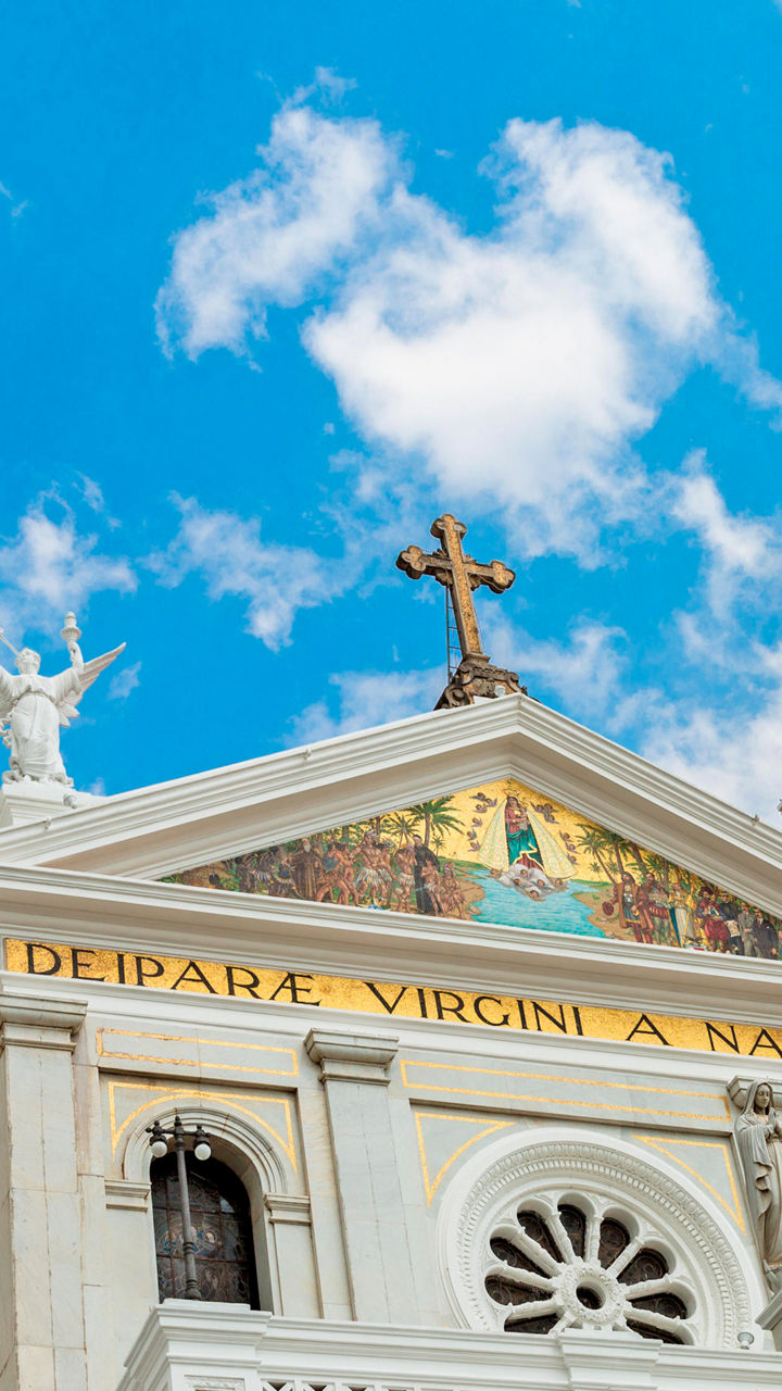 Historic church facade with blue sky