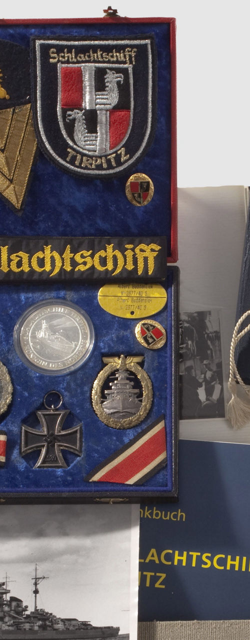 Historical naval memorabilia with photographs