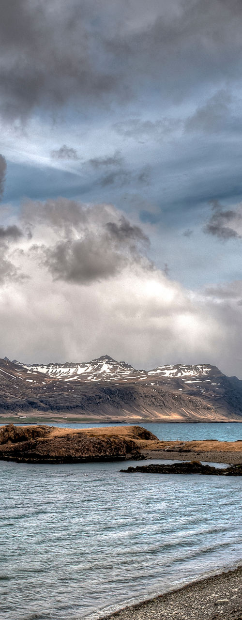 Dramatic coastal landscape with mountains
