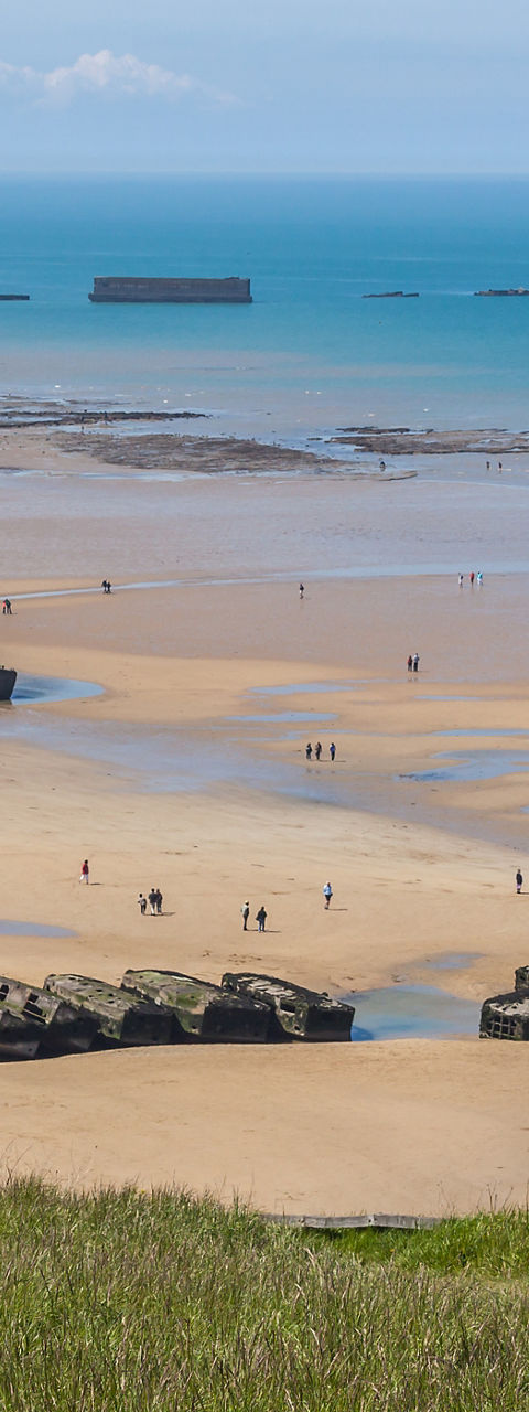Historic beach with remnants of war structures