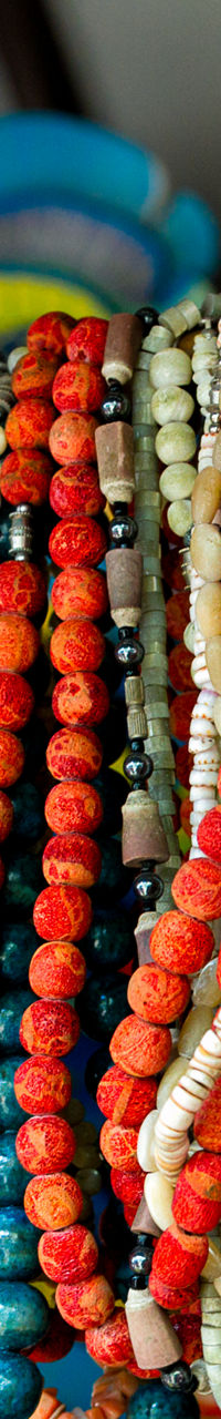 Colorful bead necklaces on display rack