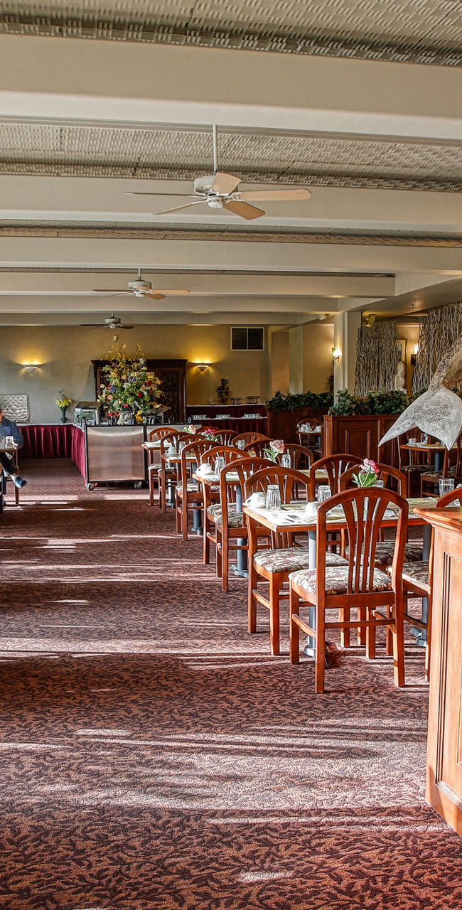 Spacious restaurant with wooden decor