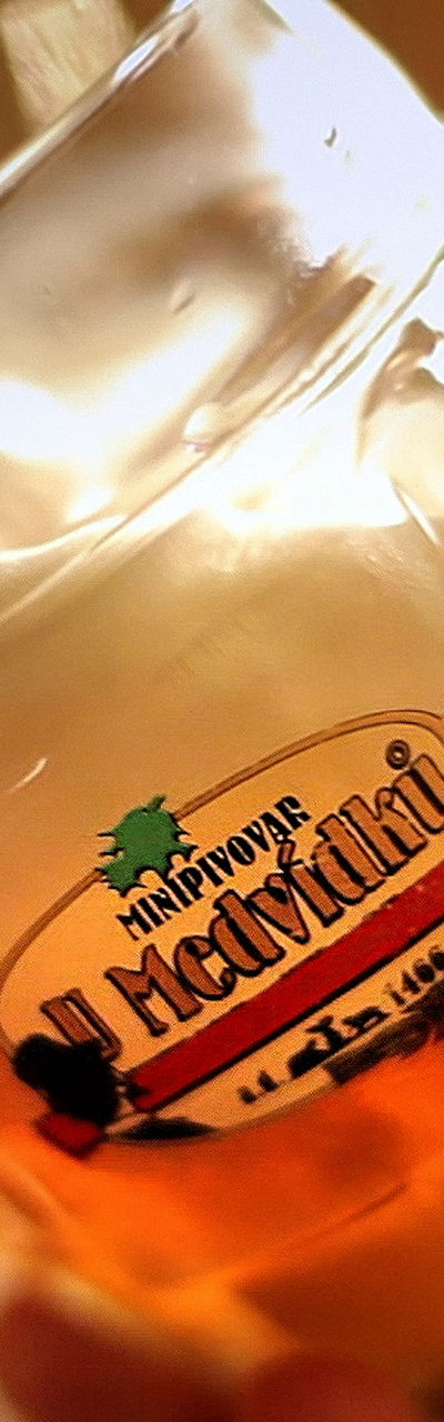 Beer poured into branded glass