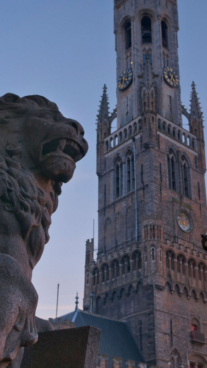 Medieval Belfry Tower at Sunset in Bruges