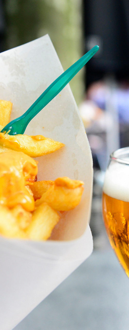 Belgian fries and Leffe beer outdoors