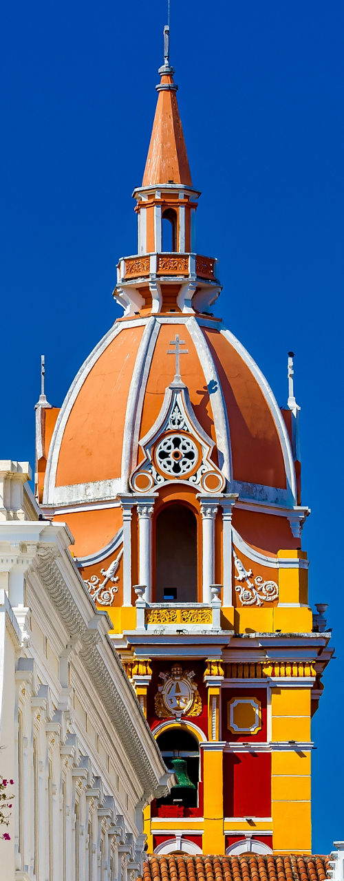 Colorful colonial street with iconic bell tower