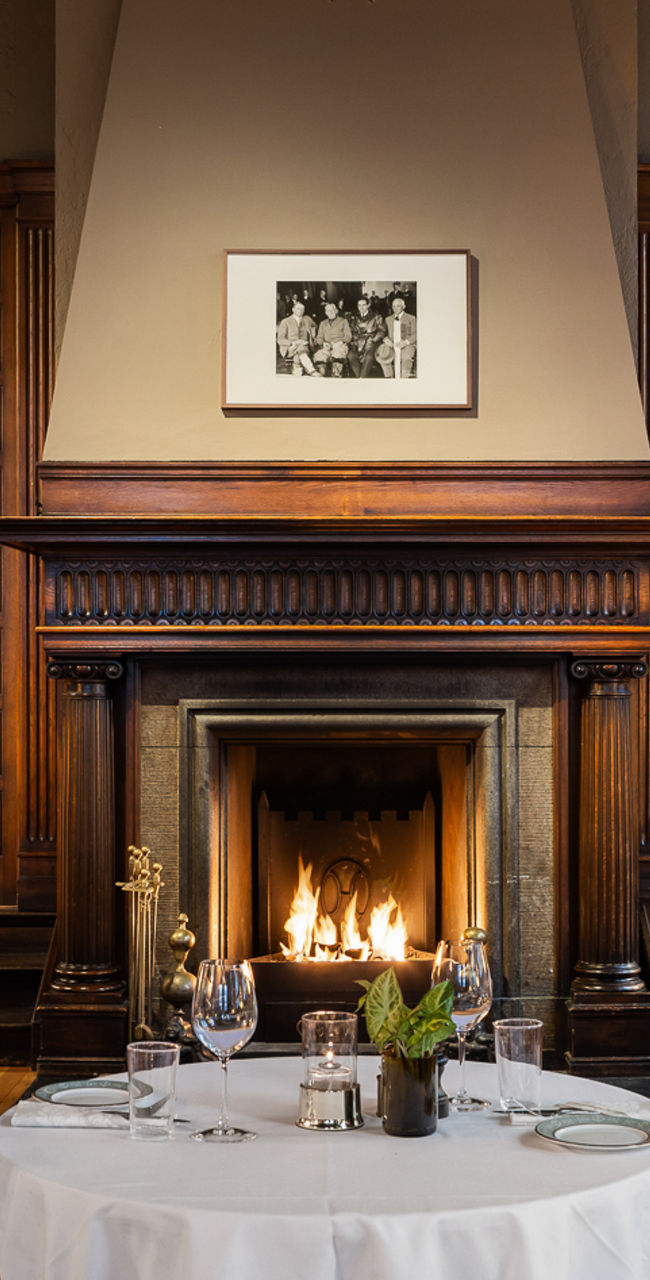 Elegant Restaurant Interior With Fireplace and Chandeliers