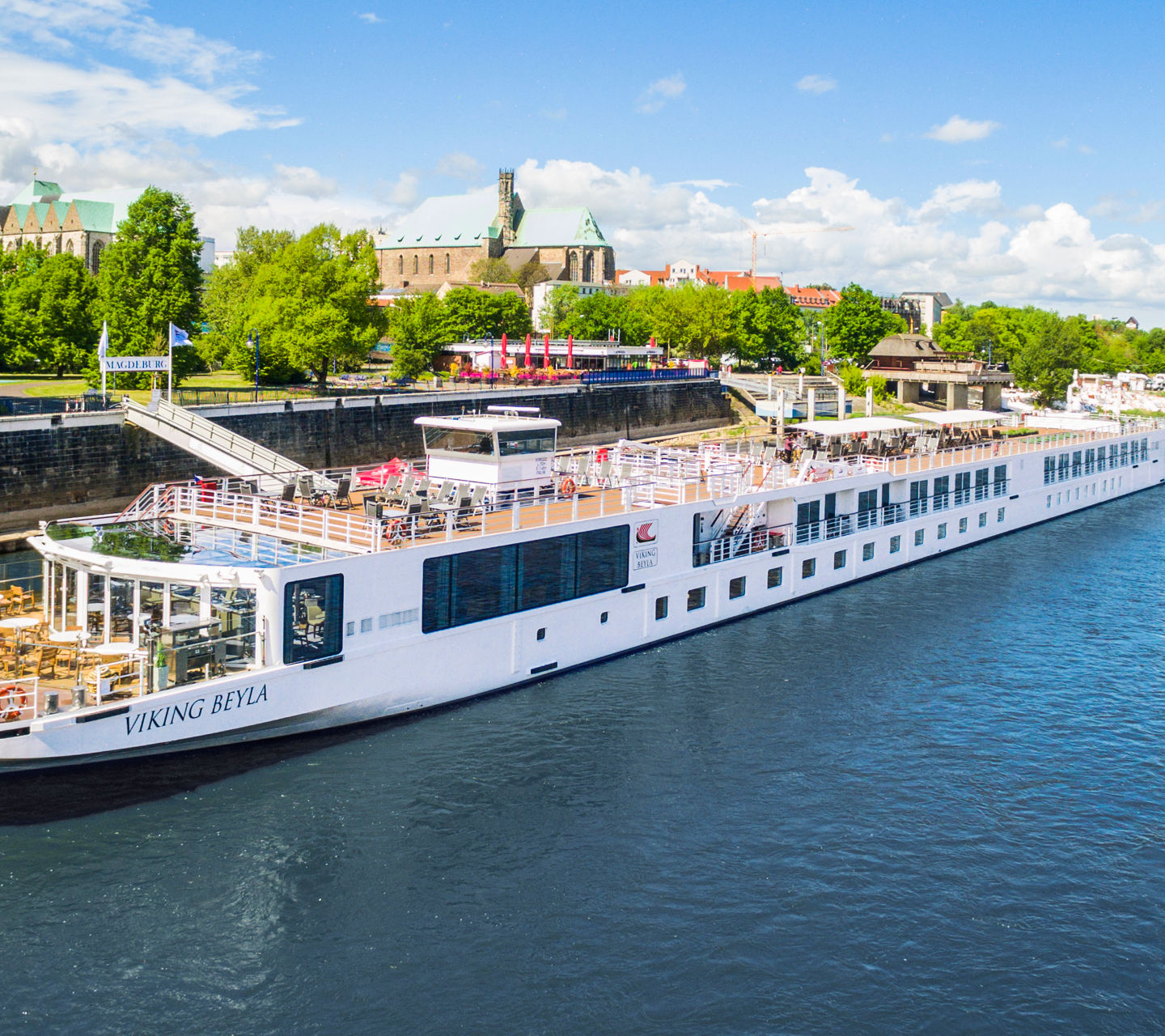 Viking river cruise ship on scenic waterway
