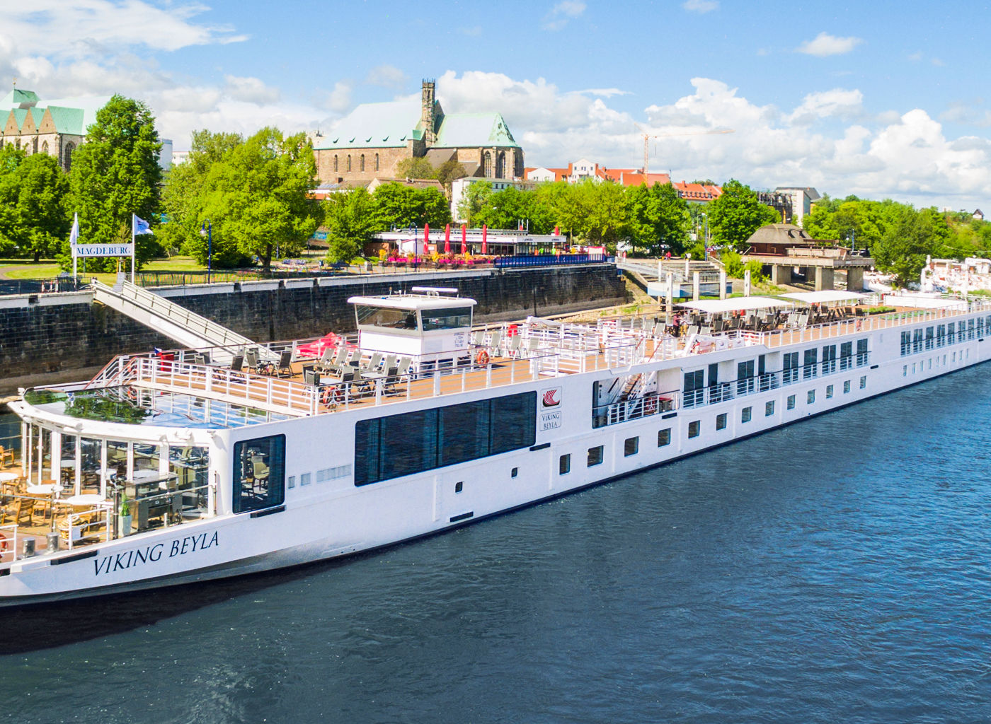 Viking river cruise ship on scenic waterway