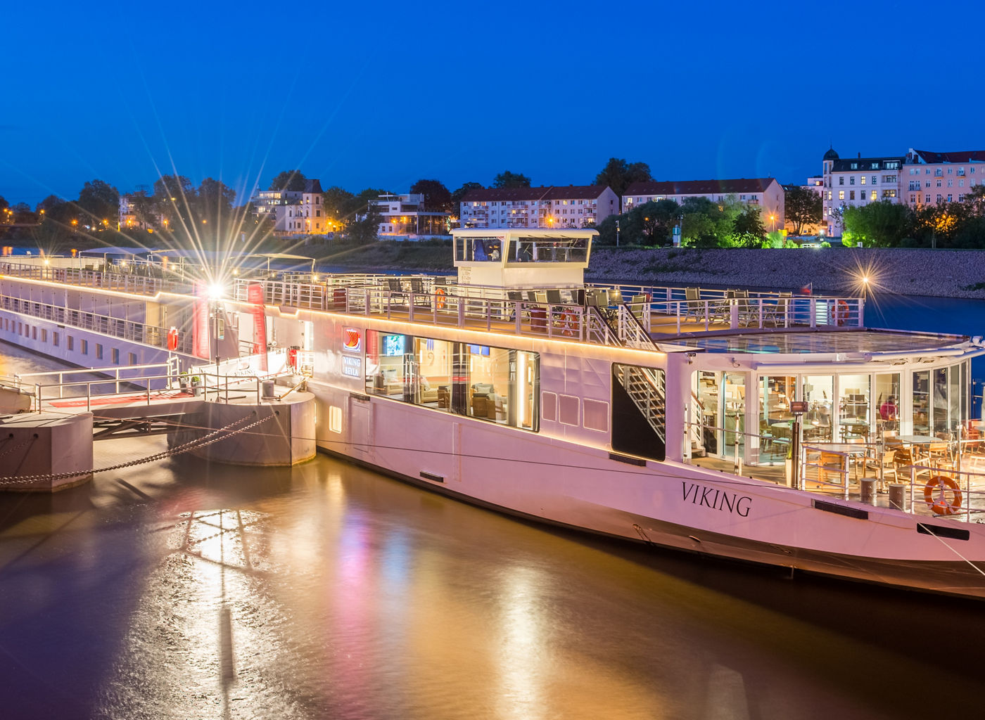 Viking river cruise docked at twilight