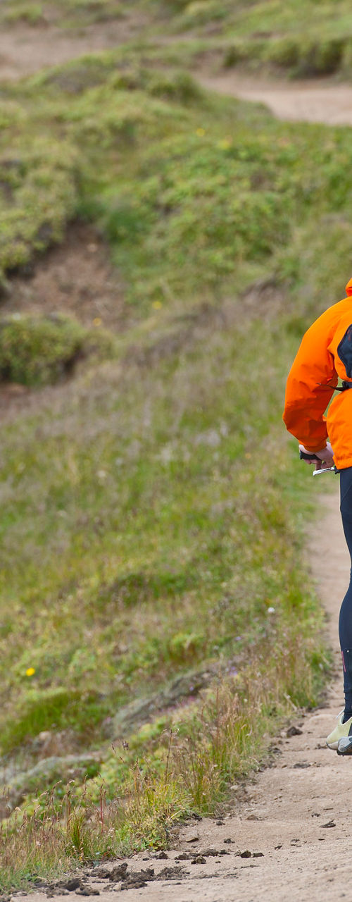 Cyclists on rugged trail in nature