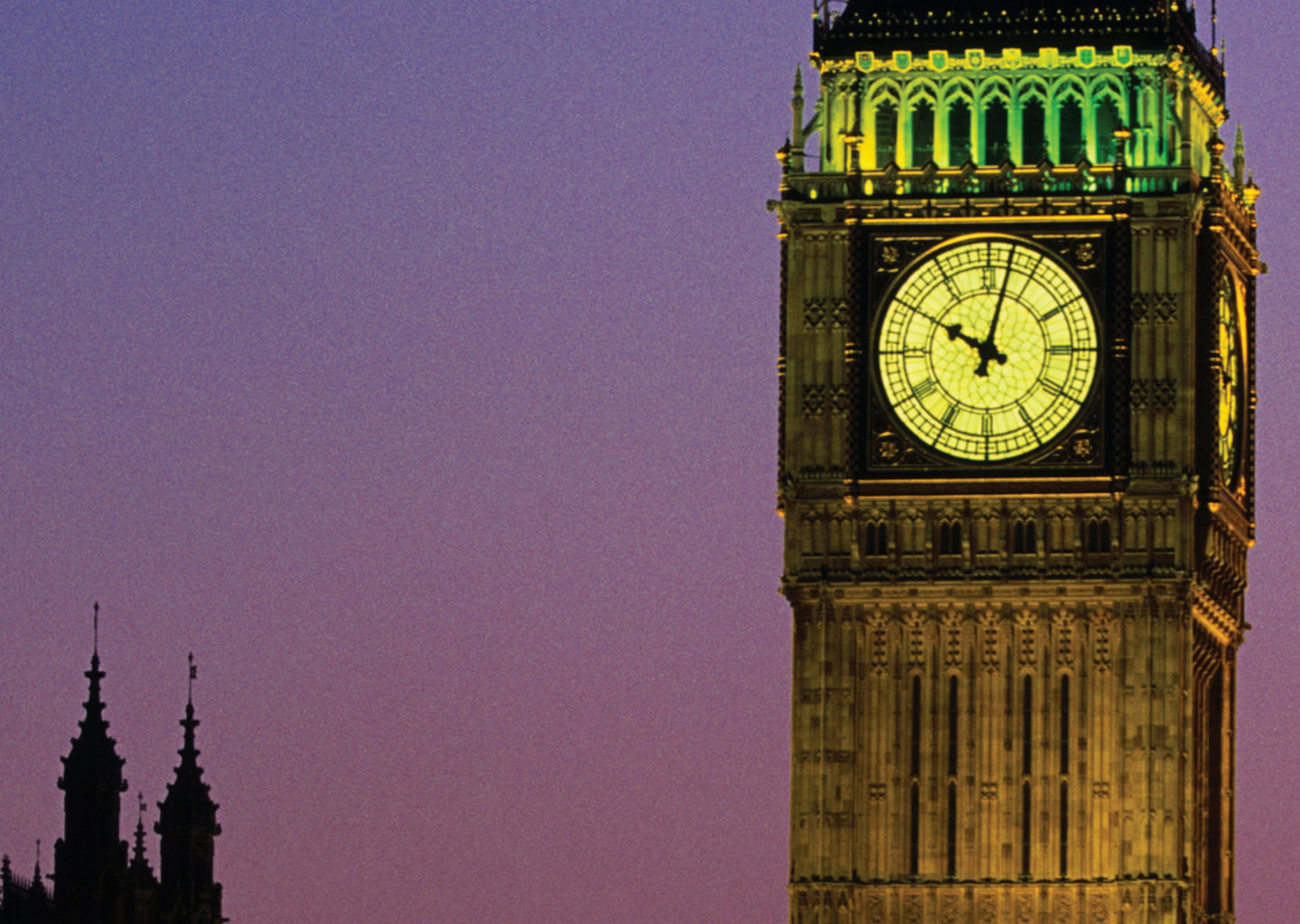 Big Ben at dusk with light trails