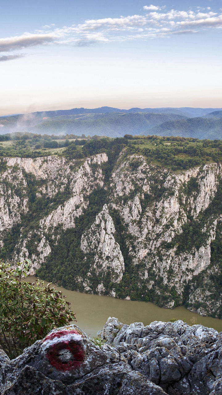 Scenic view of rocky cliffs and river