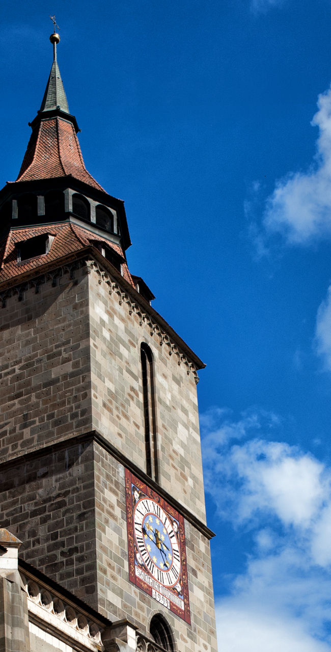 Historic church with mountain backdrop