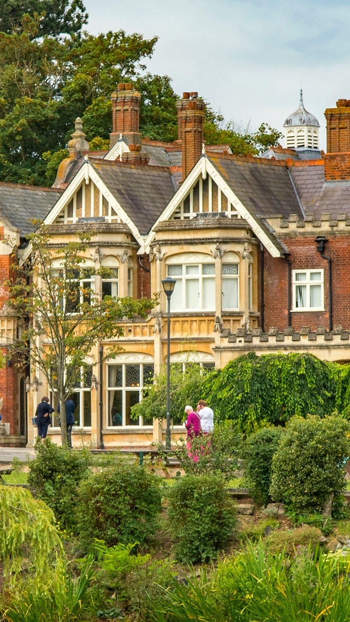Historic mansion by serene lake view