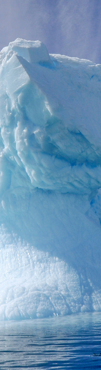 Majestic iceberg under vibrant sky