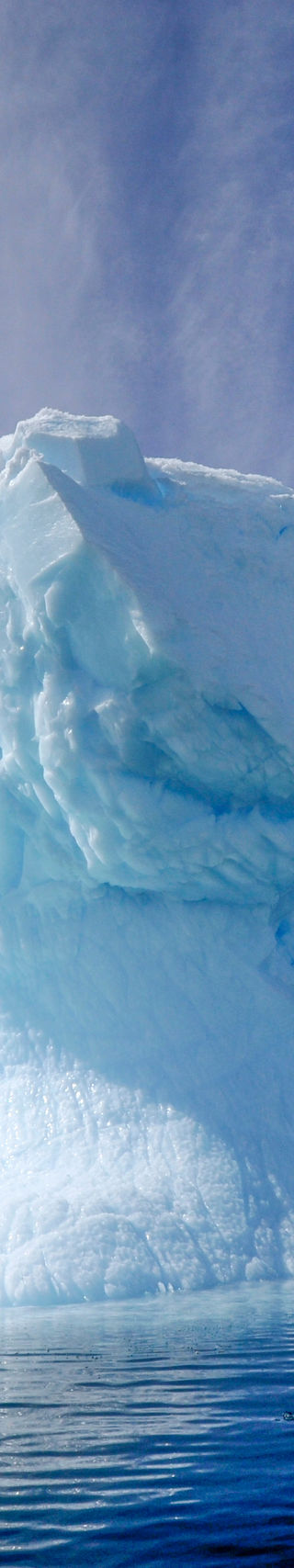 Majestic iceberg under vibrant sky