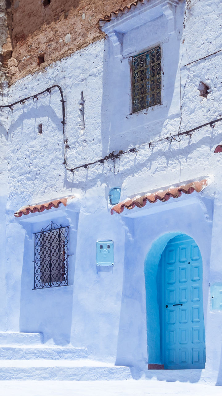 Blue-washed alley in Chefchaouen, Morocco