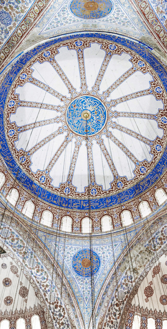 Intricate dome of historic mosque interior