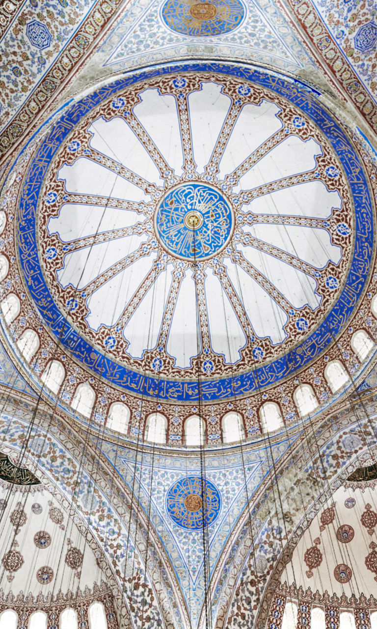 Intricate dome of historic mosque interior