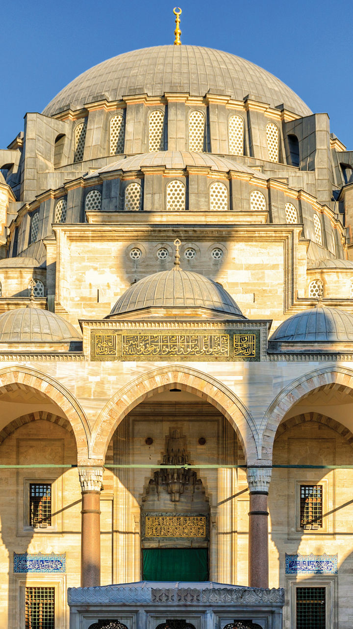 Historic mosque courtyard with domed architecture