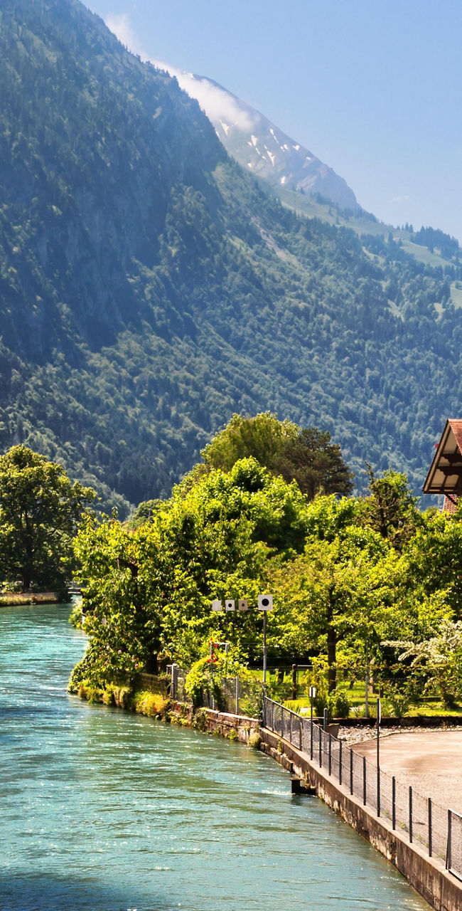 Scenic Swiss village with flowing river