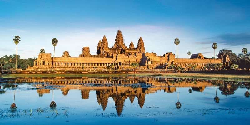 Angkor Wat temple with reflection at sunrise