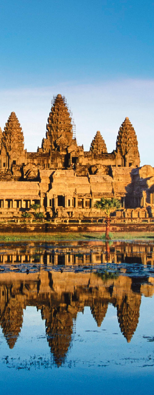 Angkor Wat temple with reflection at sunrise