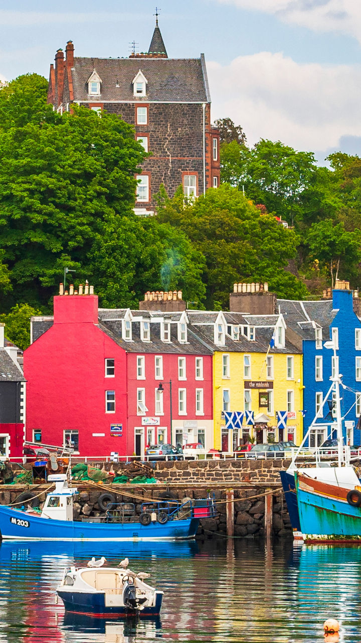 Colorful harbor town with fishing boats