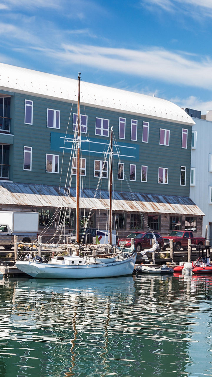Colorful waterfront buildings and docked boats