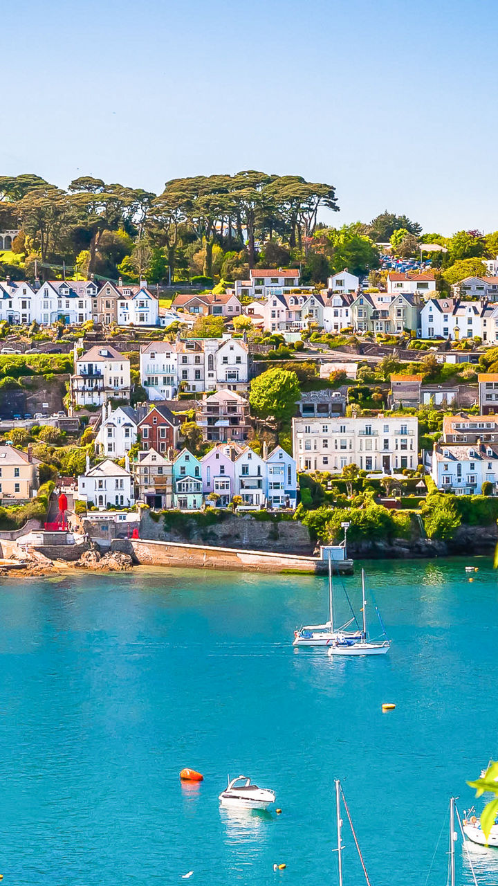 Scenic coastal village with sailboats