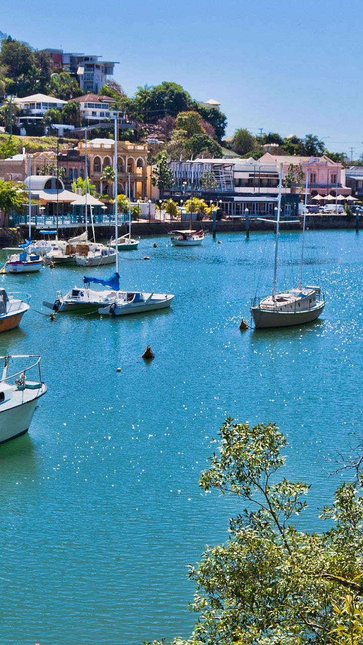 Scenic harbor with boats and waterfront homes