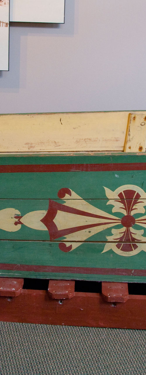 Traditional wooden sled in museum exhibit