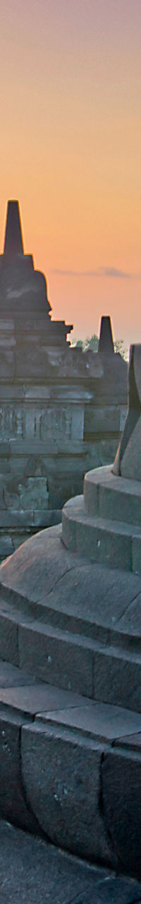 Sunrise at Borobudur Temple with Buddha statue
