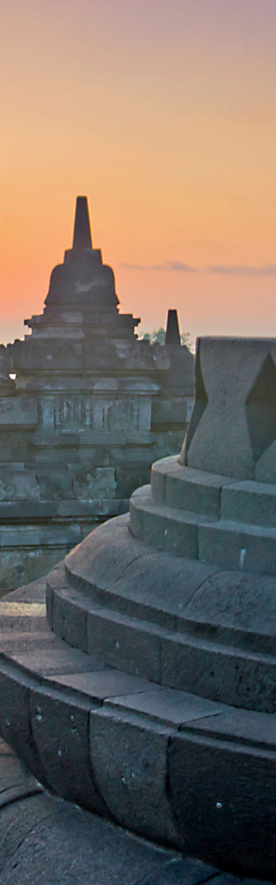 Sunrise at Borobudur Temple with Buddha statue