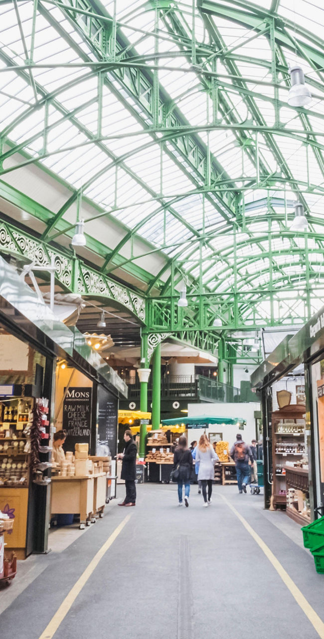 Bustling indoor market with fresh produce