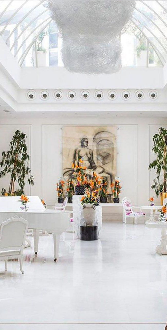 Luxurious white lobby with artistic decor
