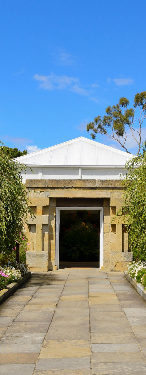 Stone pathway leading to garden building