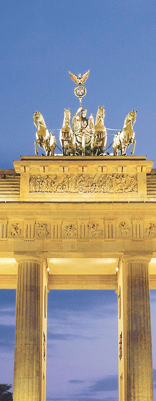Brandenburg Gate illuminated at dusk