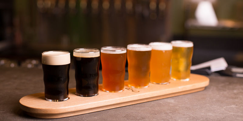 Beer flight with six assorted glasses